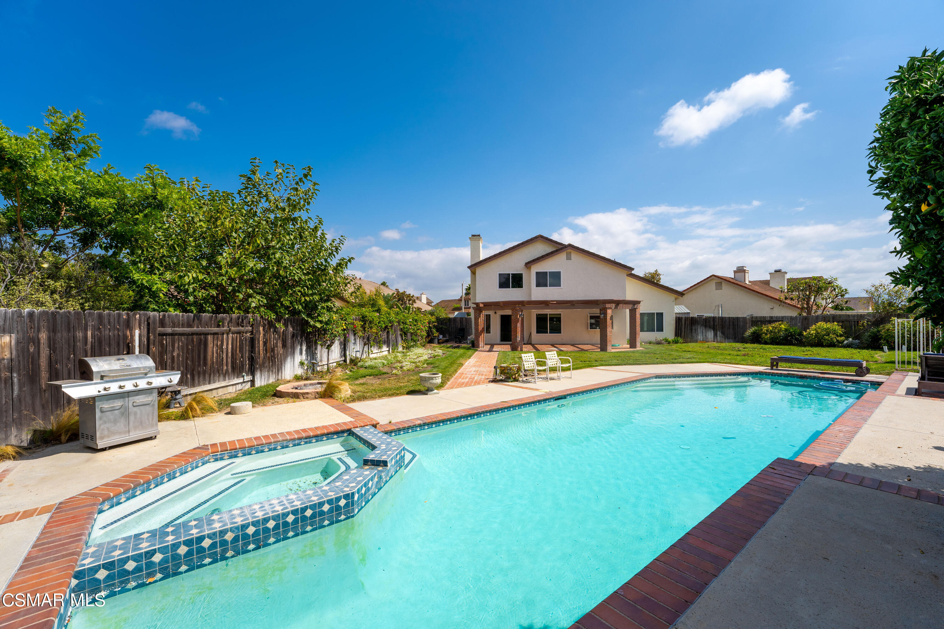 2835 Corte Caballos Camarillo, CA 93010 - Photo 30 of 35 a view of a house with swimming pool and yard