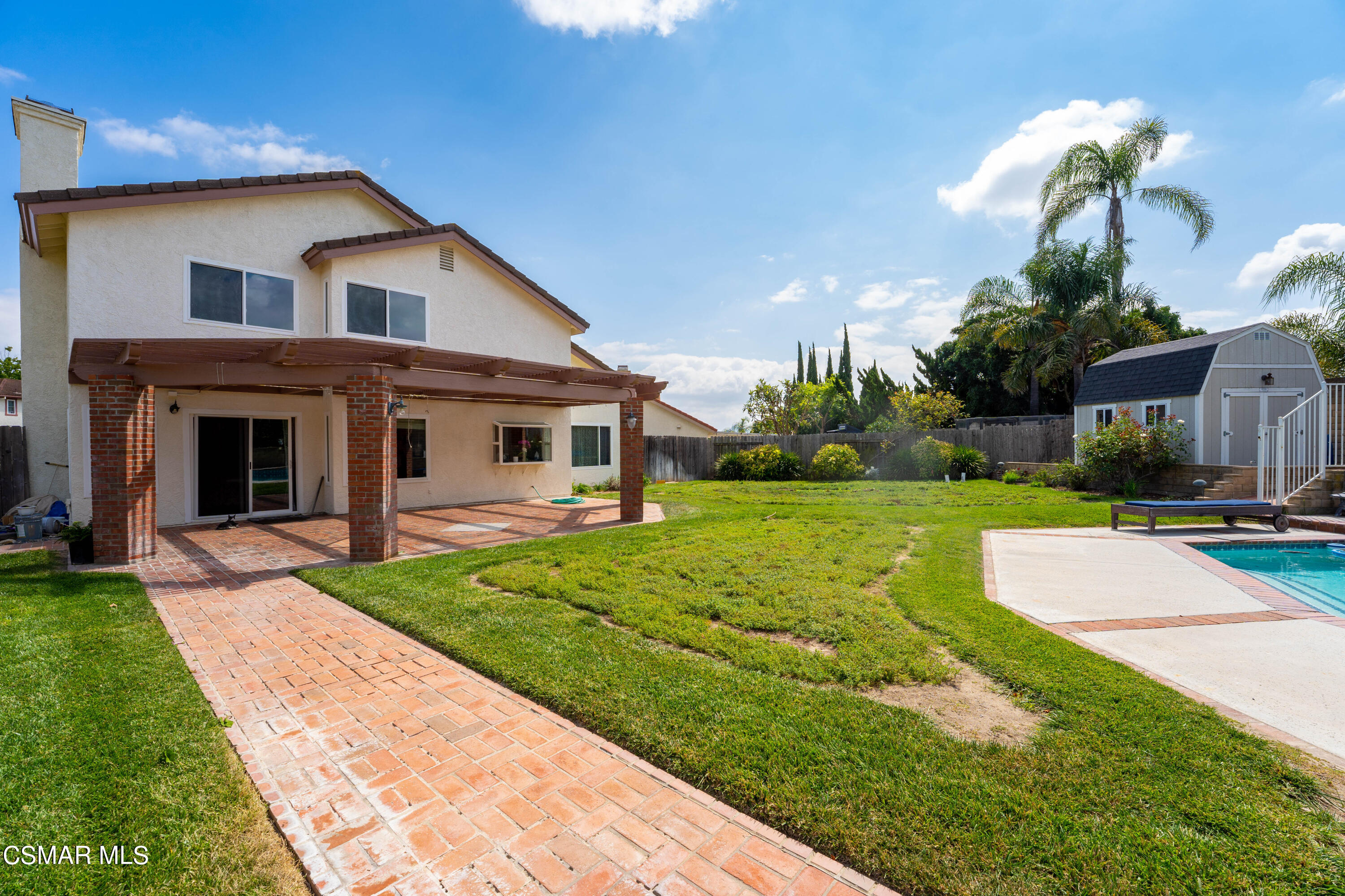 2835 Corte Caballos Camarillo, CA 93010 - Photo 34 of 35 a front view of a house with a yard and garage