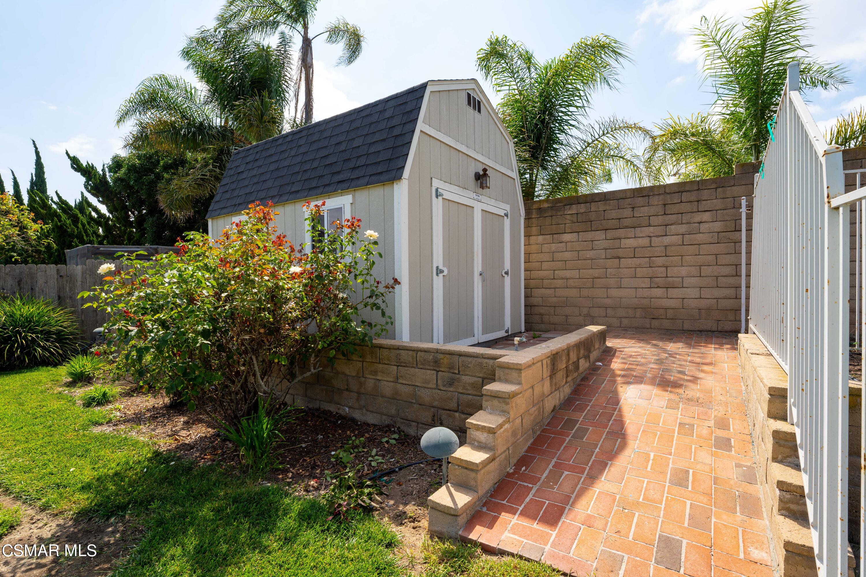 2835 Corte Caballos Camarillo, CA 93010 - Photo 35 of 35 a backyard of a house with lots of green space