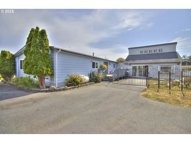 a front view of a building with garden