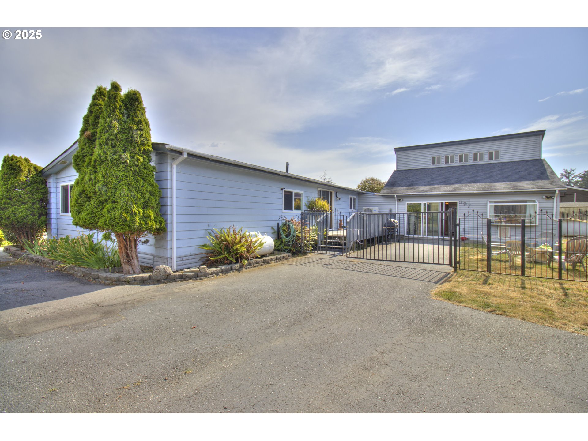 a front view of a building with garden