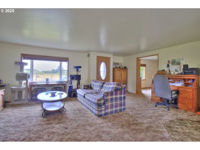 a kitchen with stainless steel appliances granite countertop a sink and a refrigerator