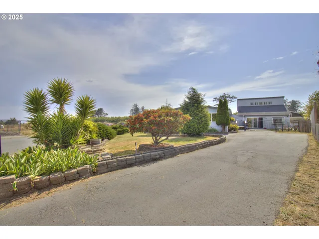 a view of a street with a building in the background