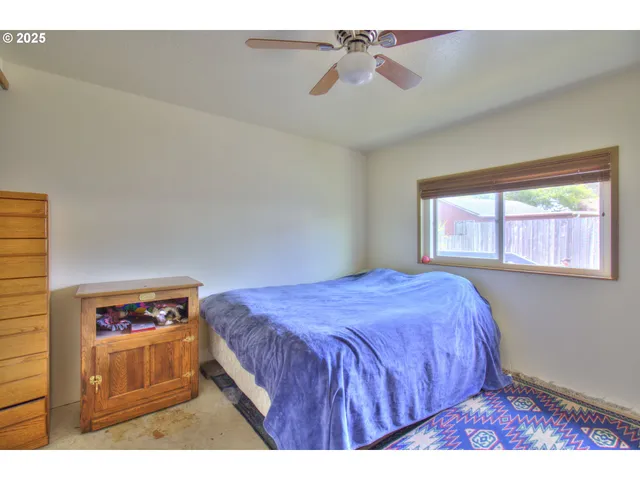 a bedroom with a bed and a walk in closet
