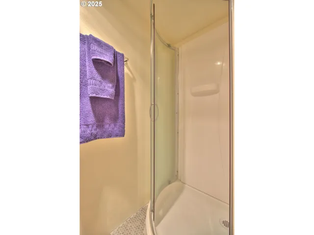 a picture of a bathroom with a shower curtain