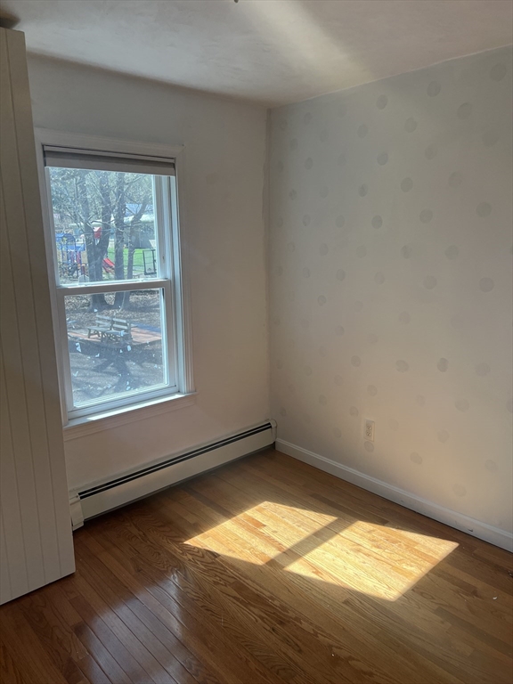 133 Pond Street Sharon, MA 02067 - Photo 13 of 17 an empty room with a window