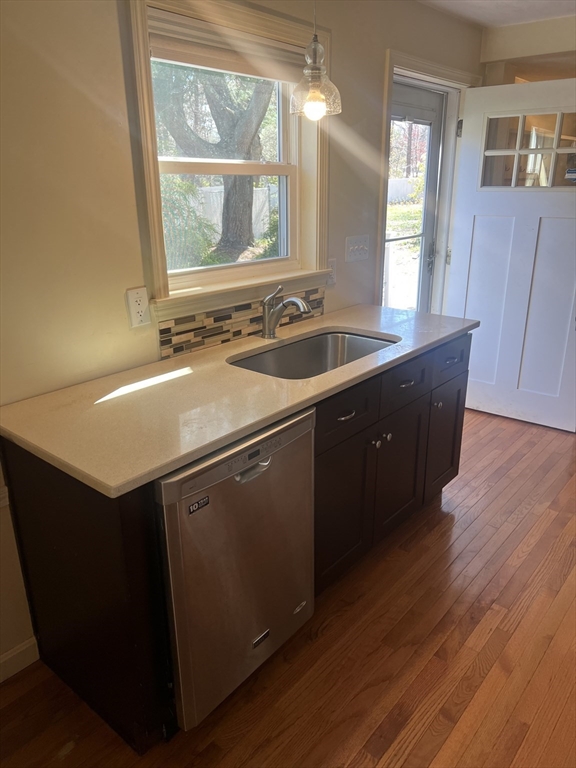 133 Pond Street Sharon, MA 02067 - Photo 4 of 17 a kitchen with a sink and a window