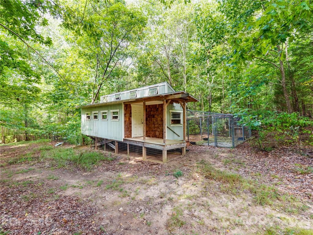 2295 Armenia Road Chester, SC 29706 - Photo 35 of 46 a backyard of a house with table and chairs