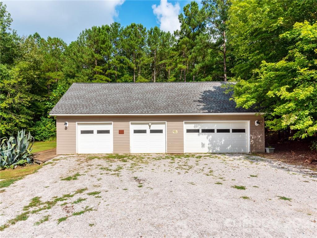 2295 Armenia Road Chester, SC 29706 - Photo 5 of 46 a front view of a house with a yard