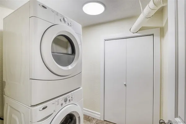 a view of a storage & utility room with washer and dryer