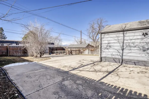 a view of a backyard of the house