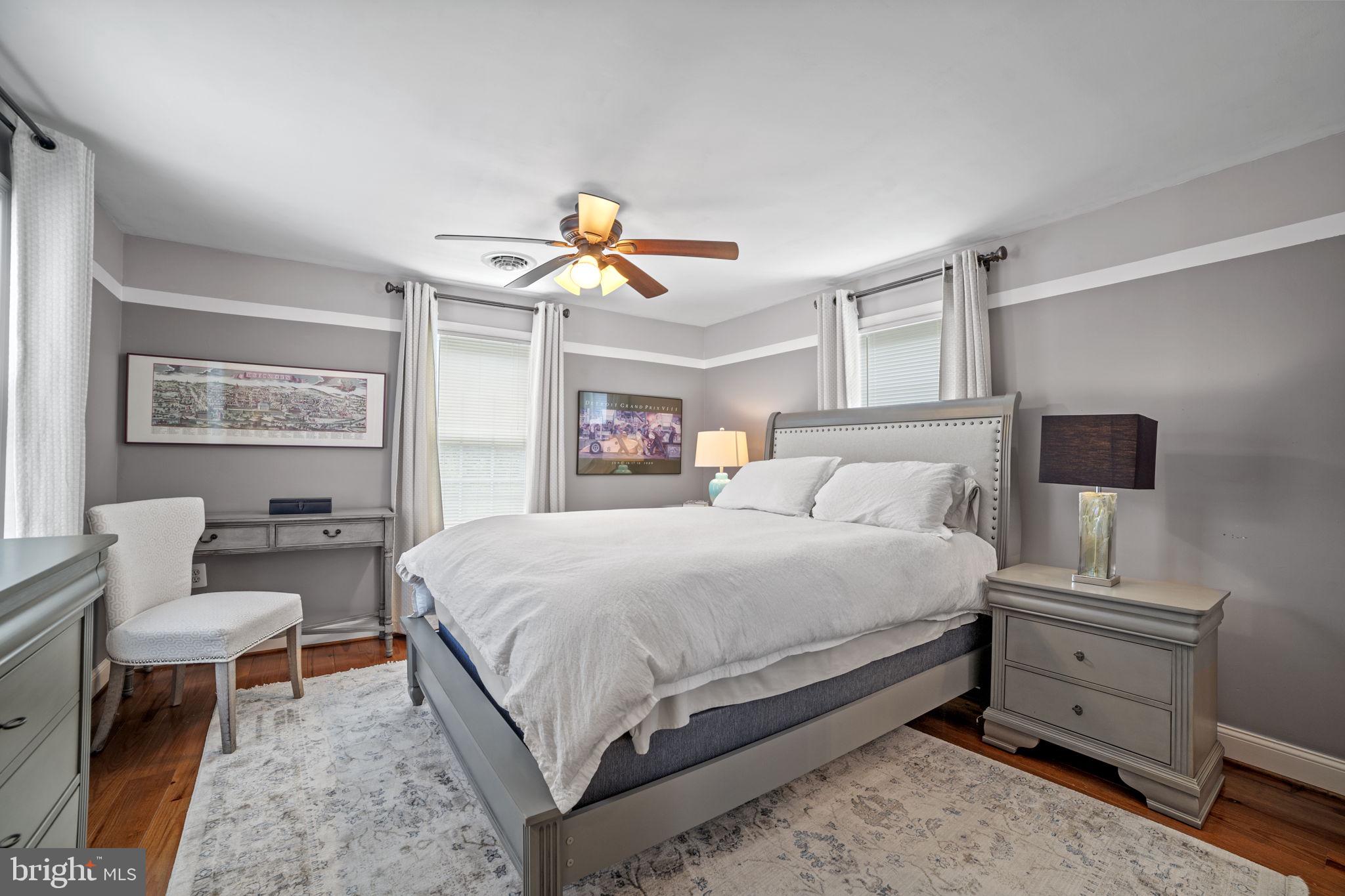 705 Dranesville Road Herndon, VA 20170 - Photo 14 of 22 Serene bedroom with modern elegance.