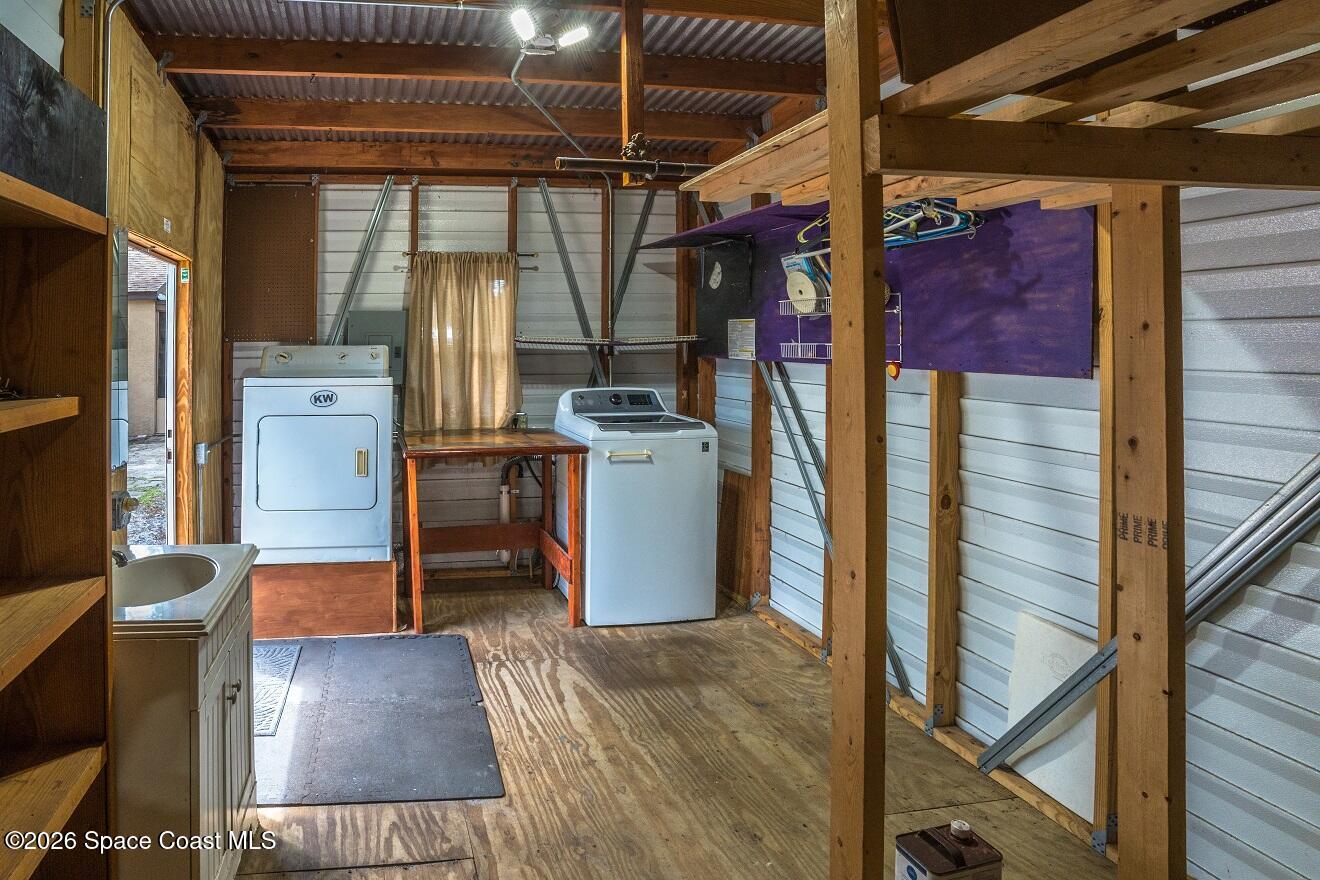 1112 Pinedale Road Rockledge, FL 32955 - Photo 12 of 15 a view of a storage & utility room