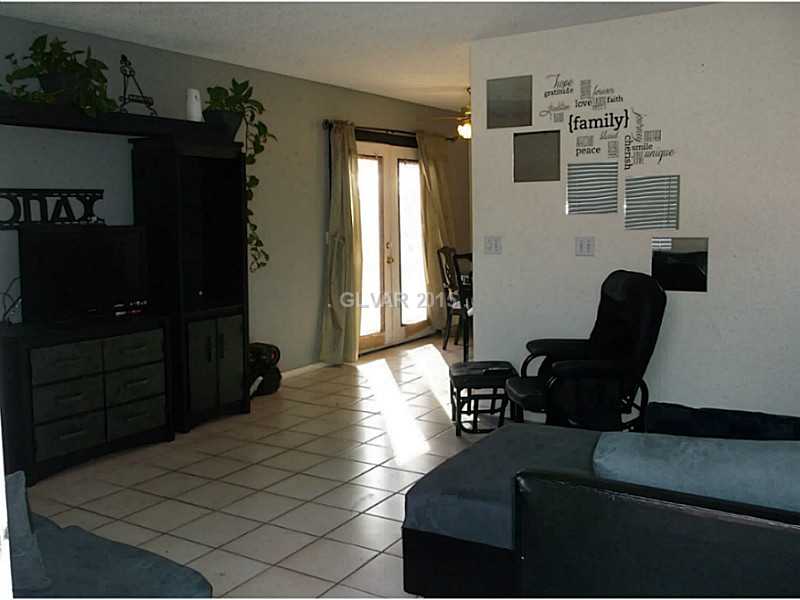 2505 Rialto Road Las Vegas, NV 89108 - Photo 3 of 33 Living Room. Spacious and Open . Notice the tile flooring