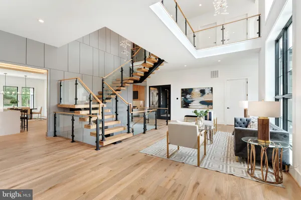 a workspace with lots of furniture and wooden floor