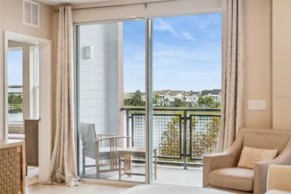 a view of a balcony with furniture
