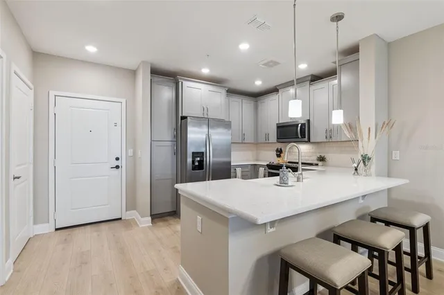a view of a a dining room and livingroom
