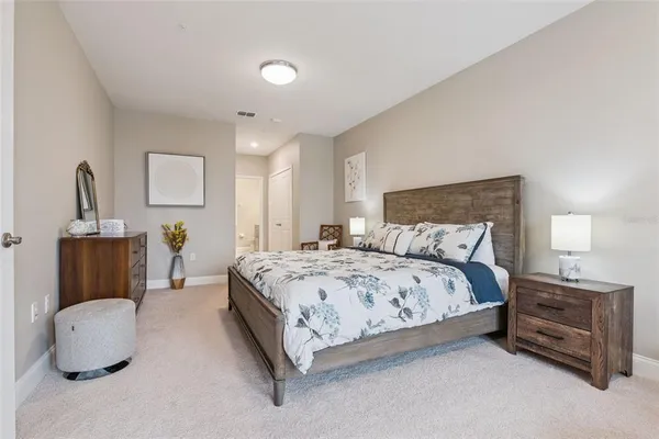 an empty room with a ceiling fan