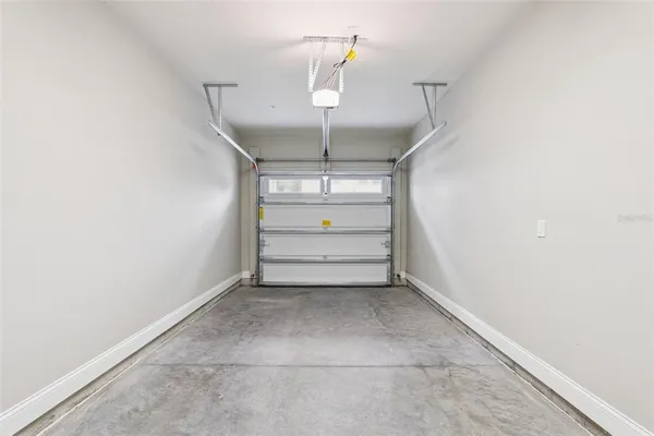 a view of swimming pool with outdoor seating and city view