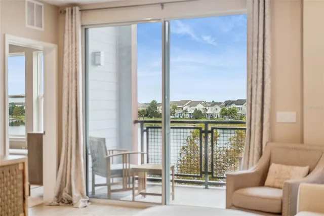 a view of a balcony with furniture