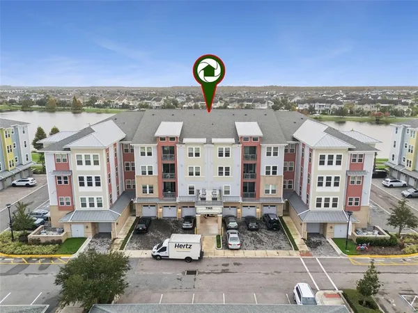 a living room with fireplace furniture and a flat screen tv