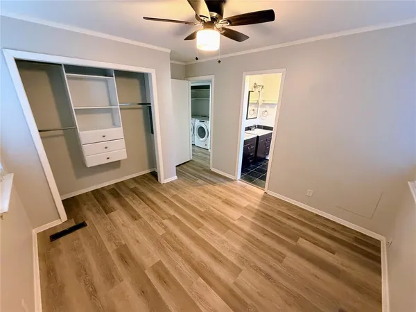wooden floor with window in an empty room