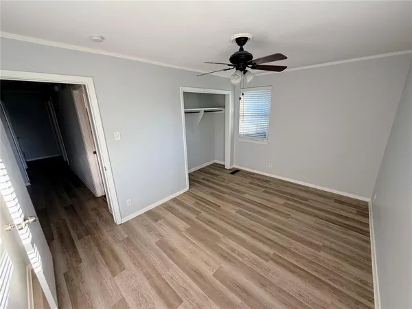 a view of a livingroom with wooden floor
