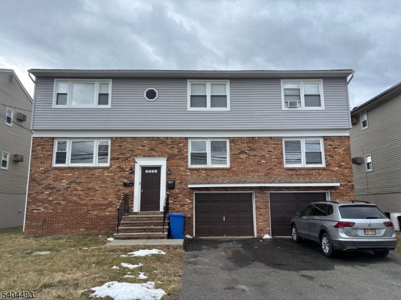 892 Hobson Street Union, NJ 07083 - Photo 1 of 14 a car parked in front of a building