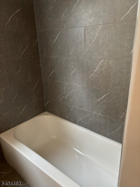 892 Hobson Street Union, NJ 07083 - Photo 10 of 14 a bathroom with a bathtub