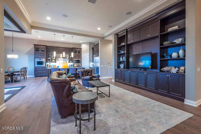 7367 Nicklaus Road Moorpark, CA 93021 - Photo 8 of 41 a living room with furniture and a flat screen tv