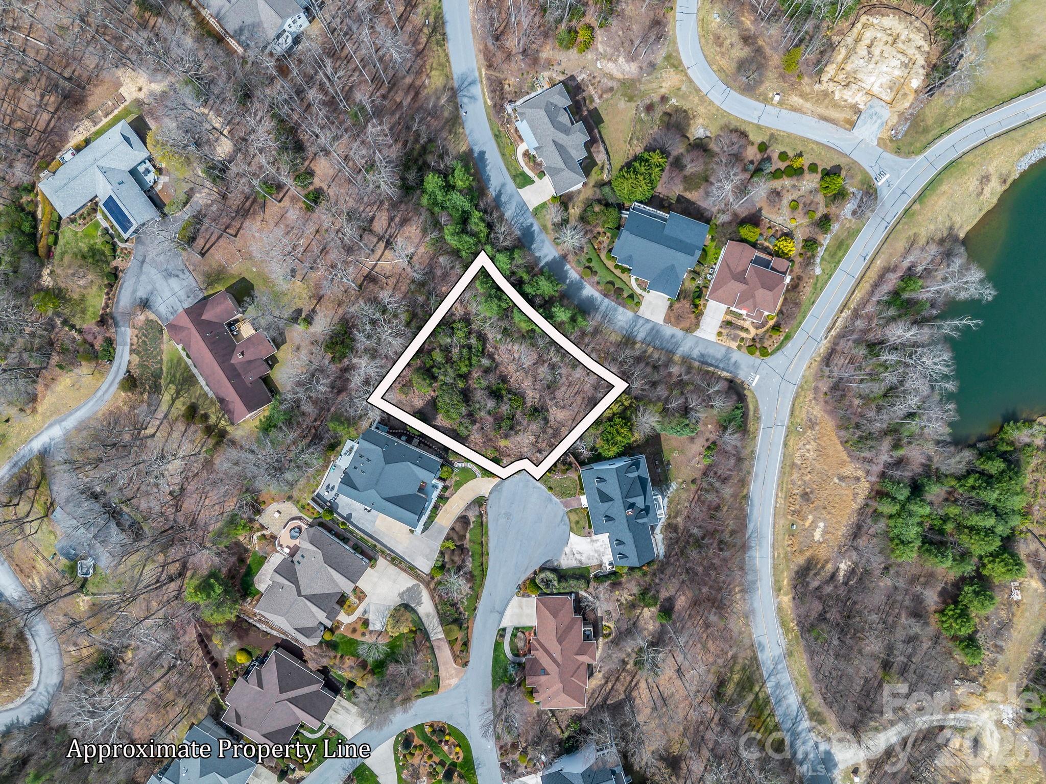 2325 Pommel Road, Unit 2325 Hendersonville, NC 28791 - Photo 4 of 19 an aerial view of a house with a garden