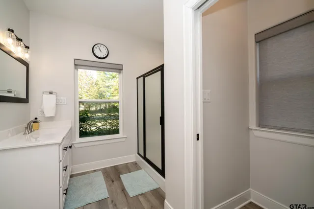 a bedroom with a bed and a cabinets