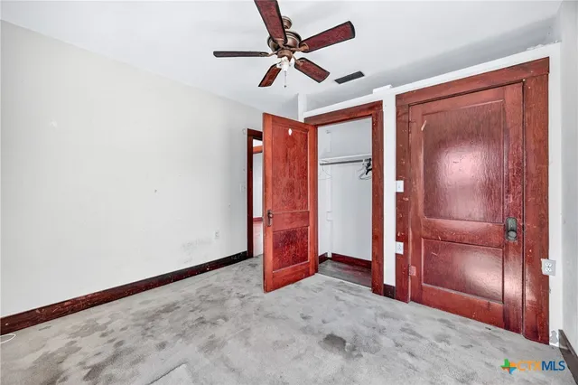 a bathroom with a sink a vanity and a mirror