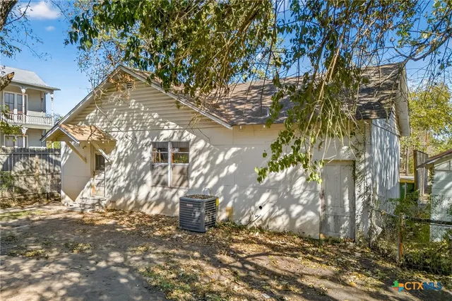 front view of a house with a street