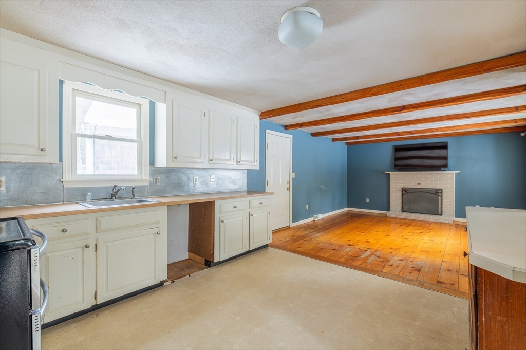 16 Michael Road Bourne, MA 02559 - Photo 11 of 41 a bedroom with a bed and a sink