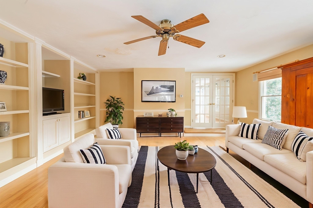16 Michael Road Bourne, MA 02559 - Photo 18 of 41 a living room with furniture and a flat screen tv