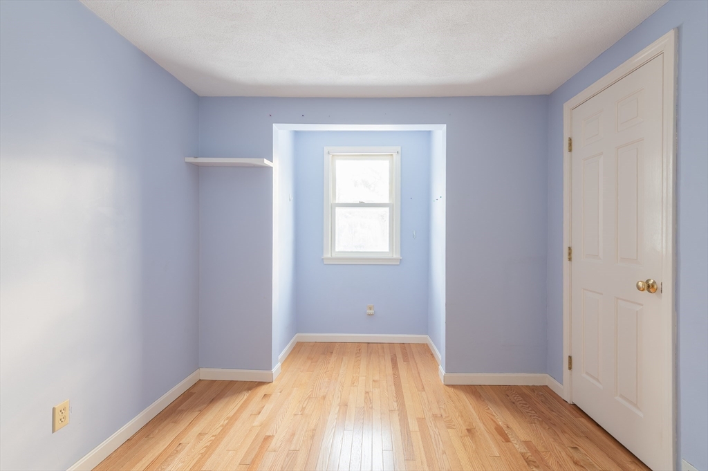 16 Michael Road Bourne, MA 02559 - Photo 28 of 41 a view of a room with wooden floor and bench