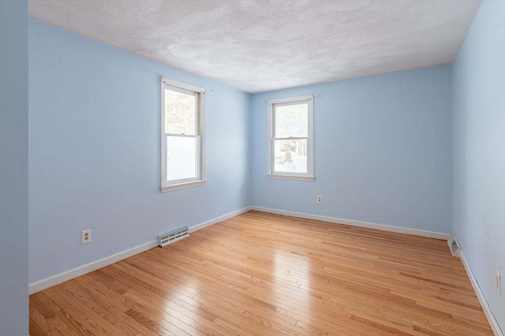 16 Michael Road Bourne, MA 02559 - Photo 30 of 41 a view of an empty room with wooden floor and a window