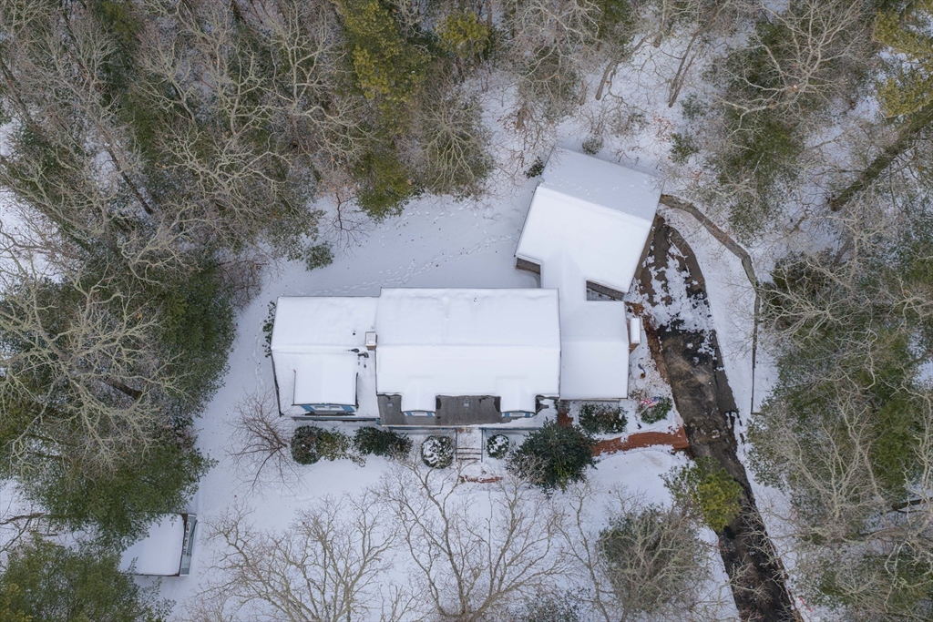 16 Michael Road Bourne, MA 02559 - Photo 3 of 41 an aerial view of a house with yard and trees