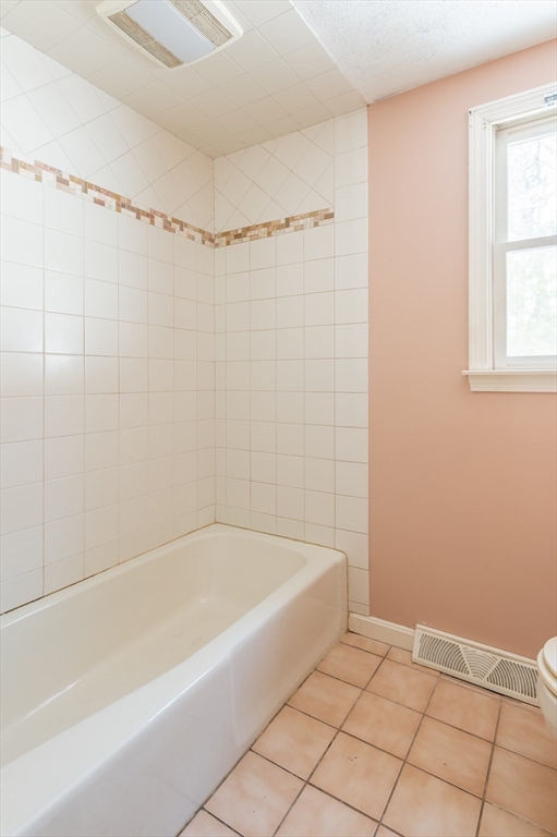 16 Michael Road Bourne, MA 02559 - Photo 34 of 41 a bathroom with a bathtub and a shower