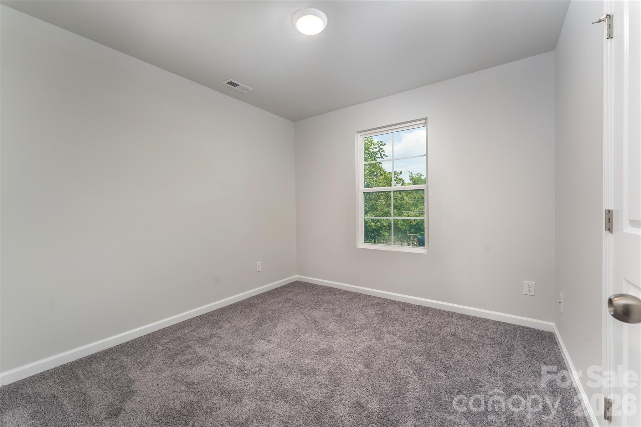 27 Forest Park Road Marion, NC 28752 - Photo 11 of 21 an empty room with a window