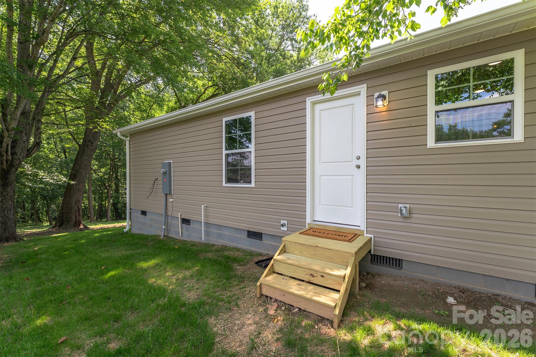 27 Forest Park Road Marion, NC 28752 - Photo 19 of 21 a view of a backyard with a sitting area
