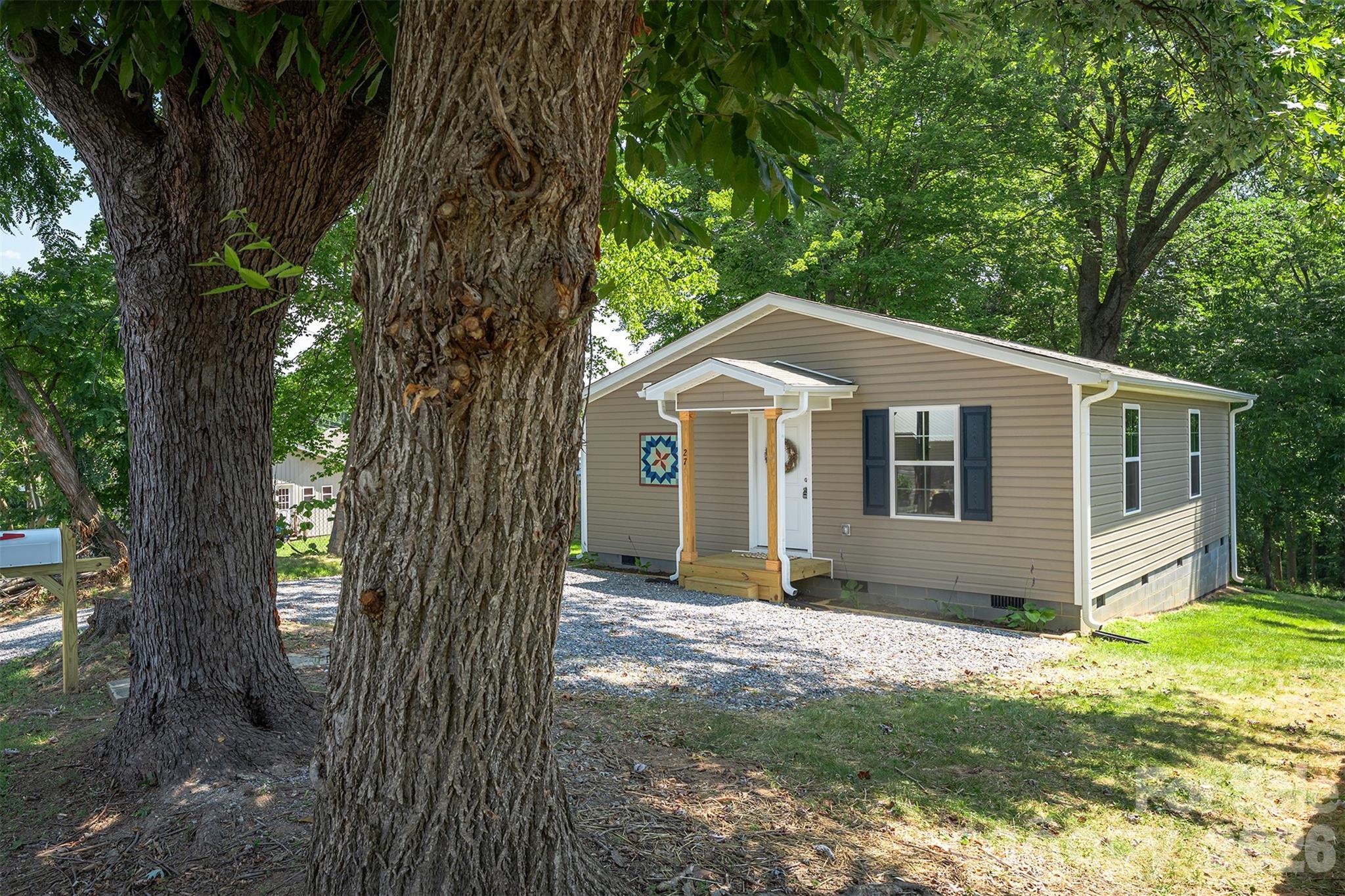 27 Forest Park Road Marion, NC 28752 - Photo 21 of 21 a front view of a house with a yard