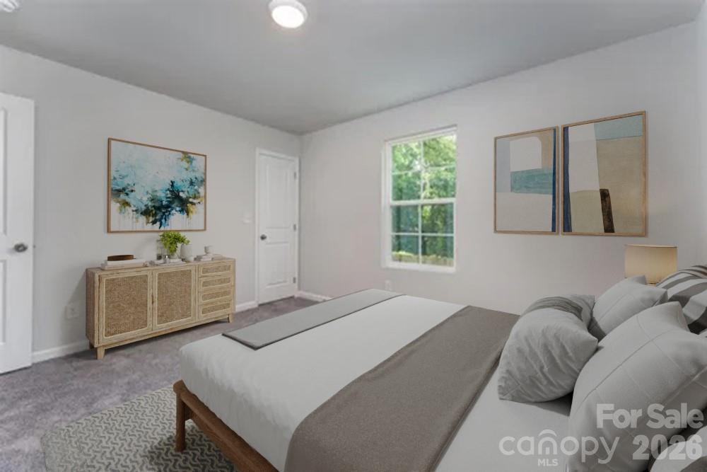 27 Forest Park Road Marion, NC 28752 - Photo 10 of 21 a bedroom with a bed and a couch