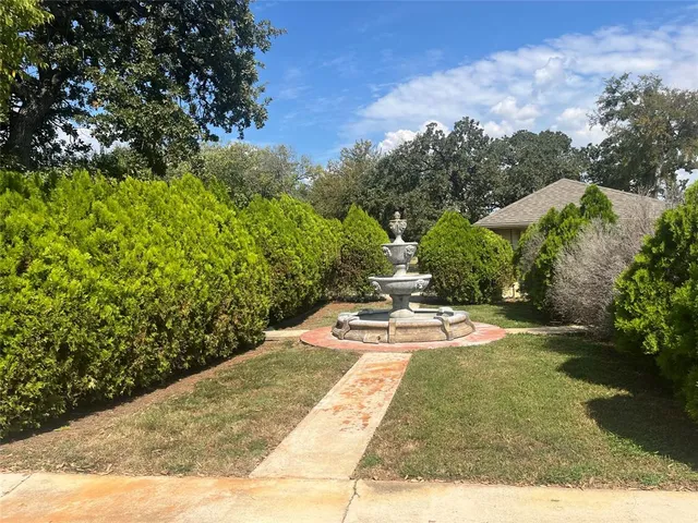 a view of outdoor space with deck and tree around
