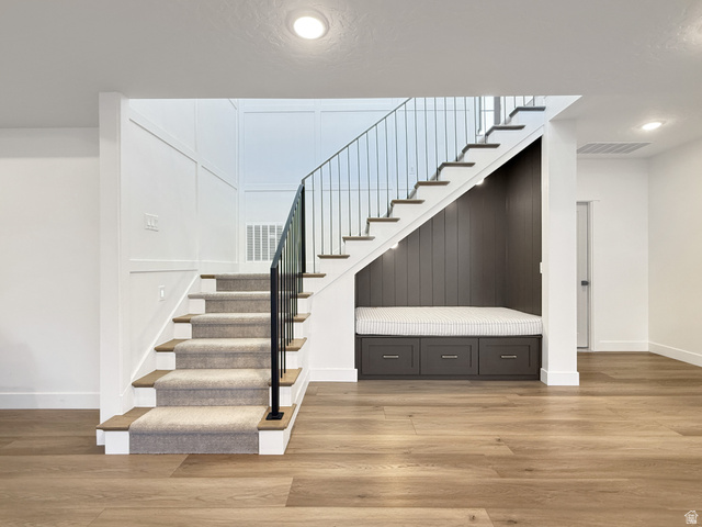 916 Rocky Mountain Way Elk Ridge, UT 84651 - Photo 37 of 54 Stairs with wood finished floors
