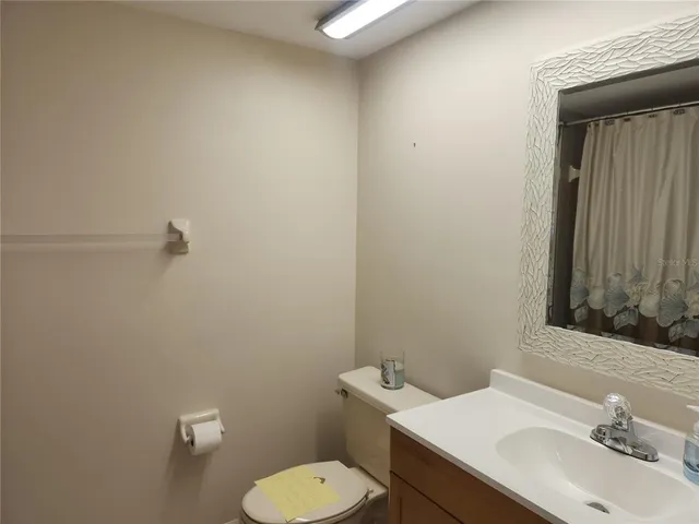 a bathroom with a shower curtain