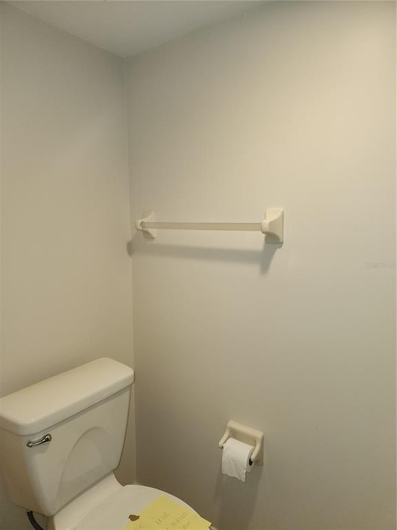 6503 Stone River Road, Unit 109 Bradenton, FL 34203 - Photo 18 of 39 a white toilet sitting next to a shower