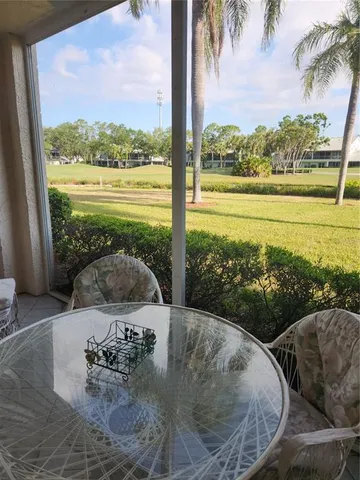 a view of a garden with an ocean view