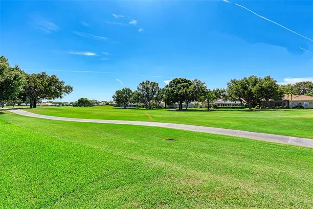 a view of a golf course with a garden